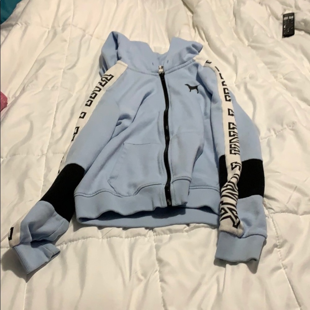 PINK light blue sweatshirt.